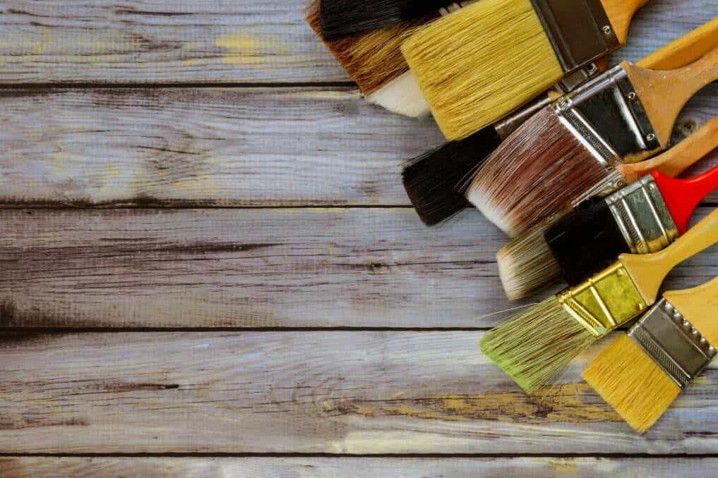 A variety of paintbrushes, for article how to paint kitchen cabinets without sanding 