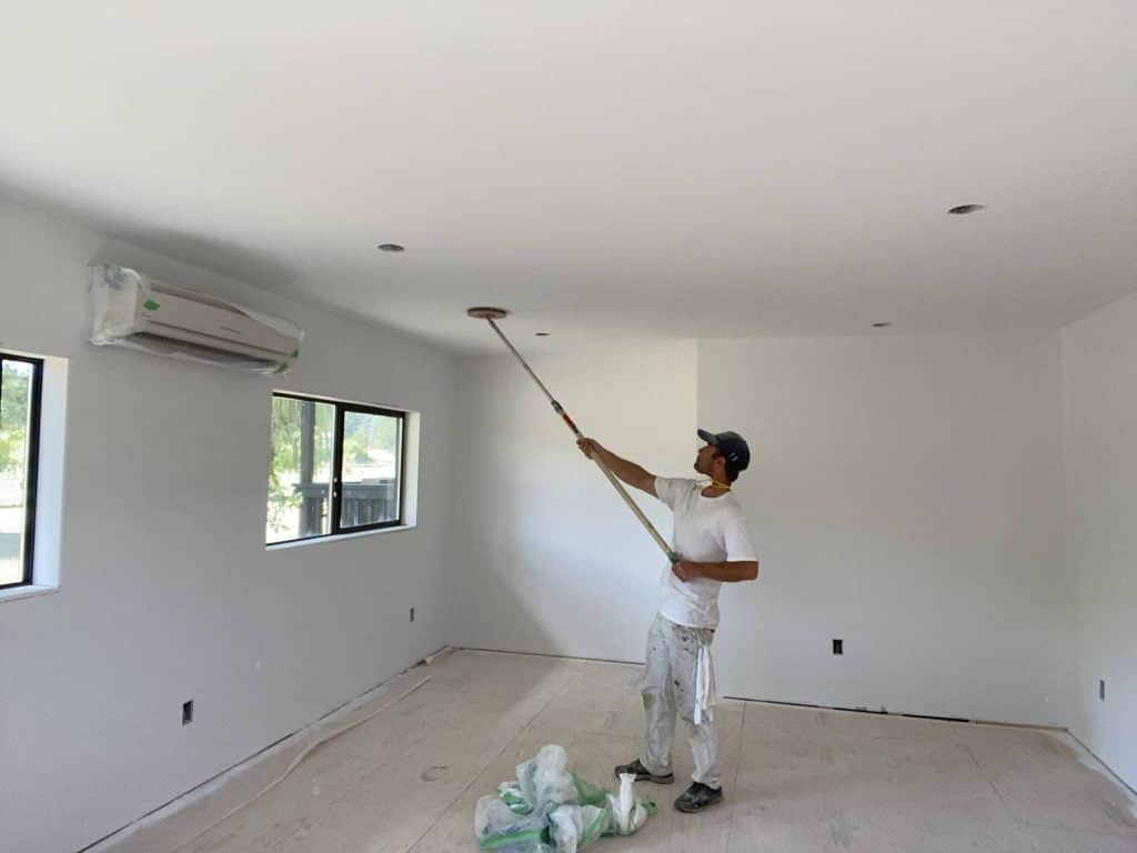Sanding a ceiling with 120-150 grit sandpaper
